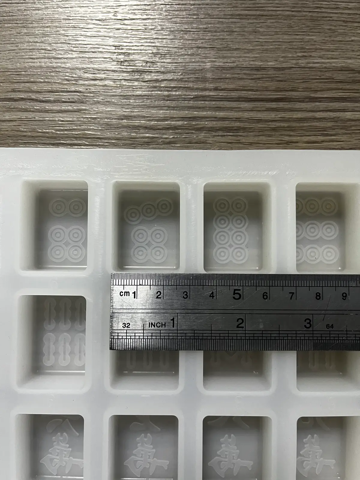Custom silicone ice-sphere mold with demolded ice