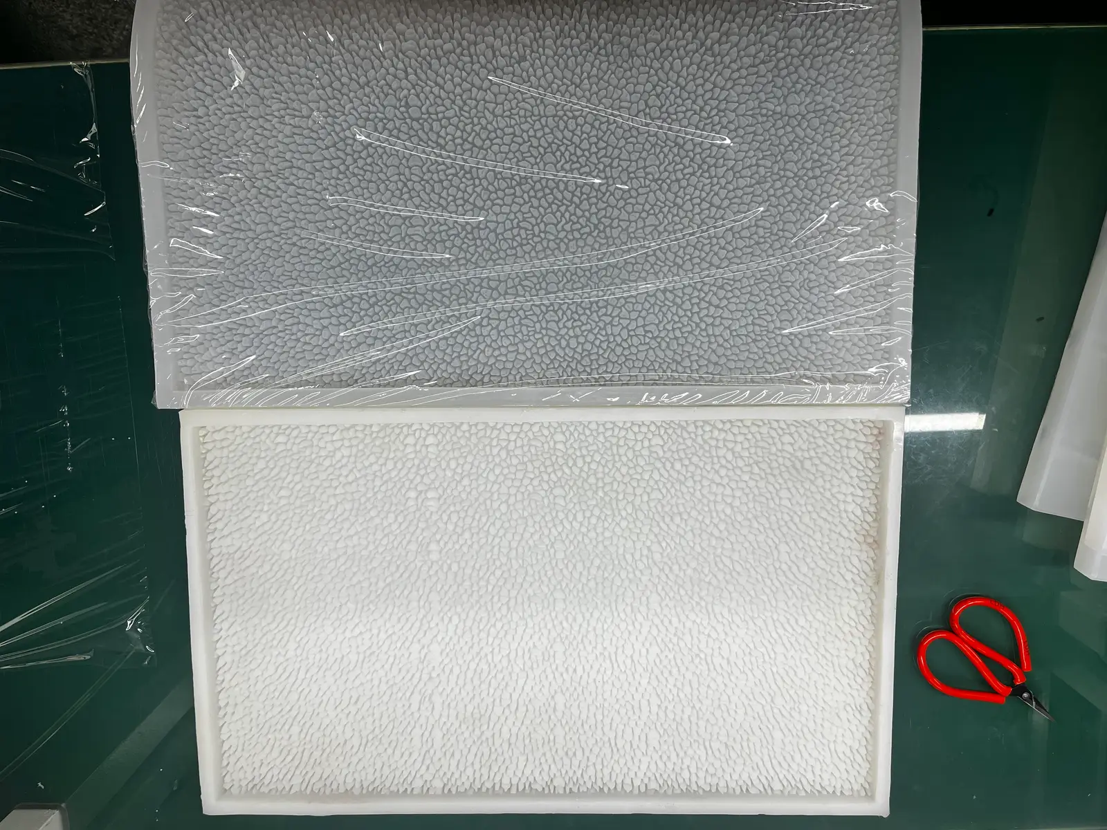 Sprues and vents on an RTV block: the dump gate, not a gummy-tray air slot