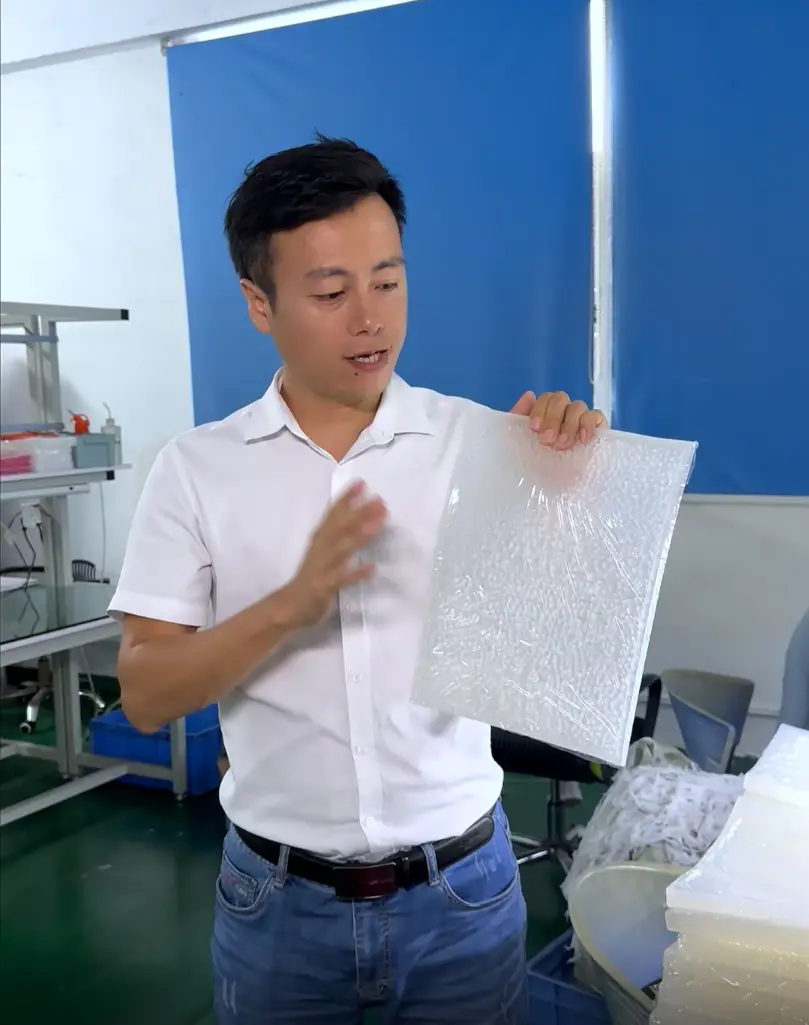 RUUIPON QC checking translucent silicone sheet material in factory